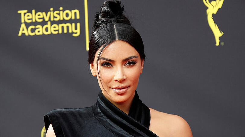 Für ein perfektes Familienfoto gibt sie alles: Kim Kardashian