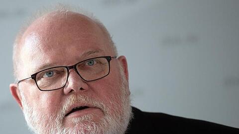 Kardinal Reinhard Marx bei einer Pressekonferenz. Foto: Federico Gambarini/dpa/Archiv