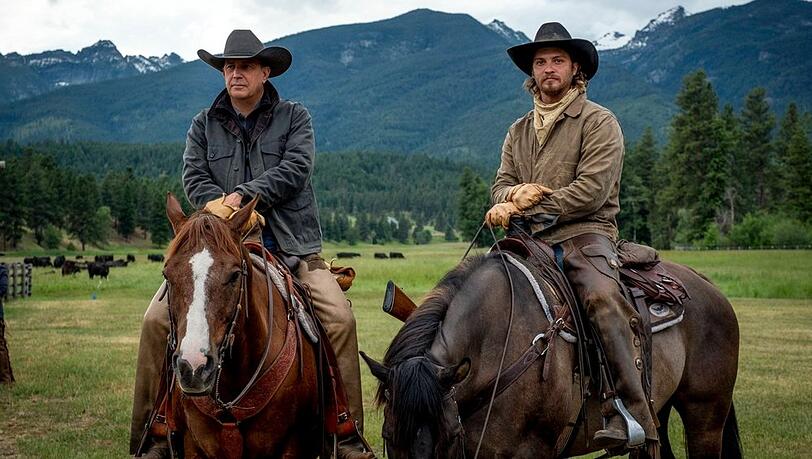 Kevin Costner und Luke Grimes in "Yellowstone". Kevin Costner und Luke Grimes in "Yellowstone".
