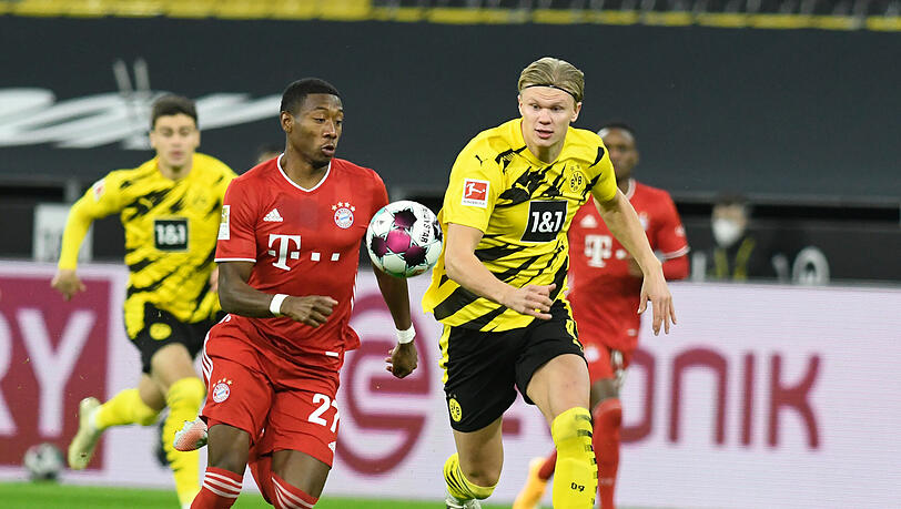 David Alaba (l.) im Zweikampf mit Dortmunds Erling Haaland. David Alaba (l.) im Zweikampf mit Dortmunds Erling Haaland.