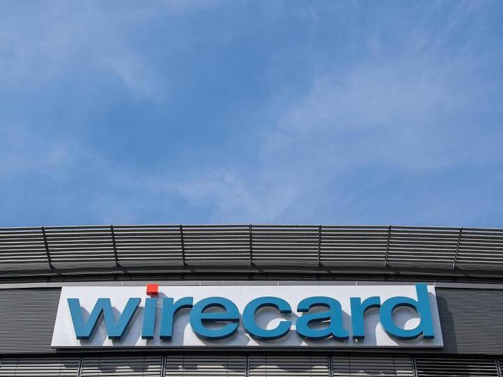 Der Schriftzug von Wirecard an der Firmenzentrale des Zahlungsdienstleisters. Foto: Peter Kneffel/dpa