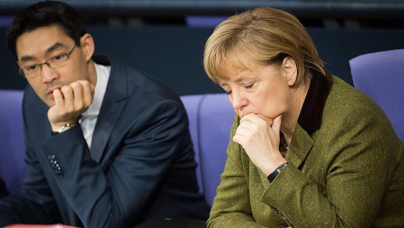 Nochmal vier Jahre? Vizekanzler Philipp Rösler und Kanzlerin Angela Merkel wirken selbst nicht richtig enthusiasmiert von dieser Vorstellung. Nochmal vier Jahre? Vizekanzler Philipp Rösler und Kanzlerin Angela Merkel wirken selbst nicht richtig enthusiasmiert von dieser Vorstellung.