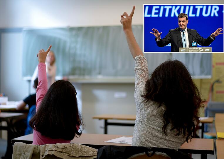 Zwei Flüchtlingsmädchen im Unterricht &ndash; auch um die Beschulung der Kinder gibt es Streit.