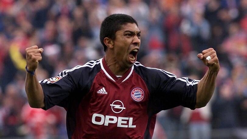 Giovane Elber (Juli 1997 - August 2003): Als Teil des "Magischen Dreiecks" beim VfB Stuttgart wechselte Giovane Elber im Sommer 1997 zu den Münchnern und schlug dort sofort ein. 264 Mal streift sich der Brasilianer das Trikot des FC Bayern über, erzielte dabei 139 Treffer und legte für 57 weitere Tore vor. Mit den Bayern kann Elber zwölf Titel einheimsen. Sein größter Erfolg war der Gewinn der Champions League 2001. Obwohl er in der Saison 2002/03 die Torjägerkanone gewinnen konnte, wurde er im Sommer 2003 an Olympique Lyon abgegeben. Auch nach seiner aktiven Karriere blieb Giovane Elber dem FC Bayern München treu, war für den Klub drei Jahre als Scout tätig und hat aktuell eine Funktion als Klubrepräsentant inne.