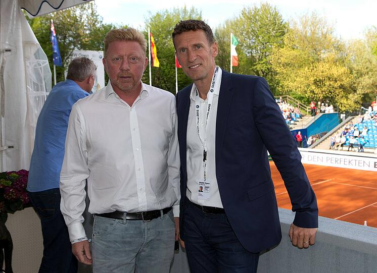 Ex-Tennisprofis unter sich: Boris Becker und Patrik Kühnen (r.).
