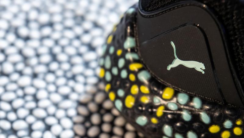 Das Logo von Puma auf einem Schuh. Foto: Daniel Karmann Das Logo von Puma auf einem Schuh. Foto: Daniel Karmann