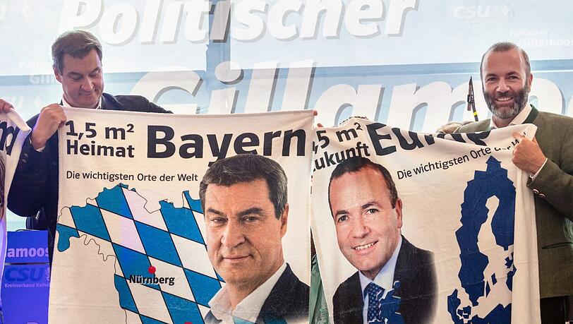 Handtücher als Geschenke gab es für Markus Söder (l.) und Manfred Weber (mit und ohne Bart).