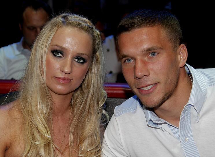 Ein schönes Paar: Lukas Podolski mit seiner Frau Monika.