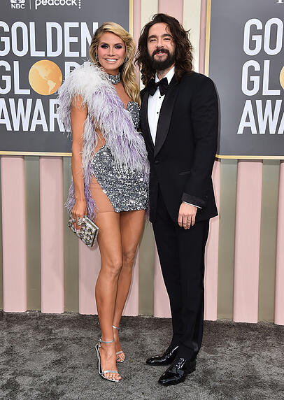 Heidi Klum liefert im Glitzer-Mini Nachtclub-Stimmung statt "Golden Globes"-Glamour. Heidi Klum liefert im Glitzer-Mini Nachtclub-Stimmung statt "Golden Globes"-Glamour.