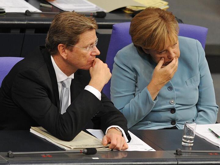 Schlechte Umfragewertte für Bundeskanzlerin Merkel und ihren Koalitionspartner Guido Westerwelle