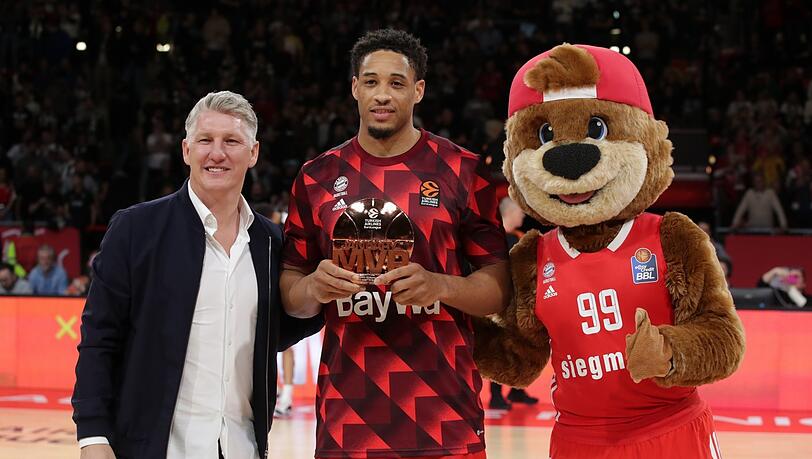 Bastian Schweinsteiger und Augustine Rubit.