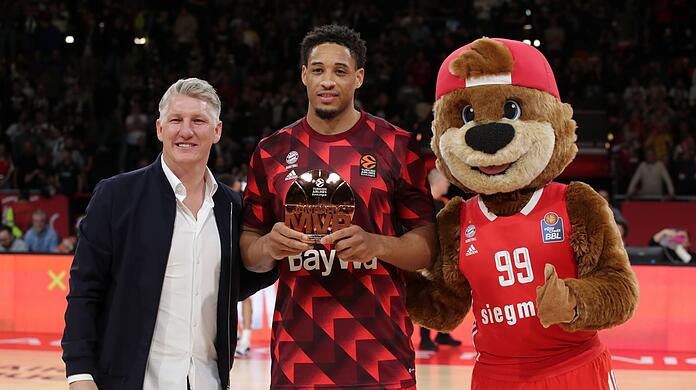Bastian Schweinsteiger und Augustine Rubit.