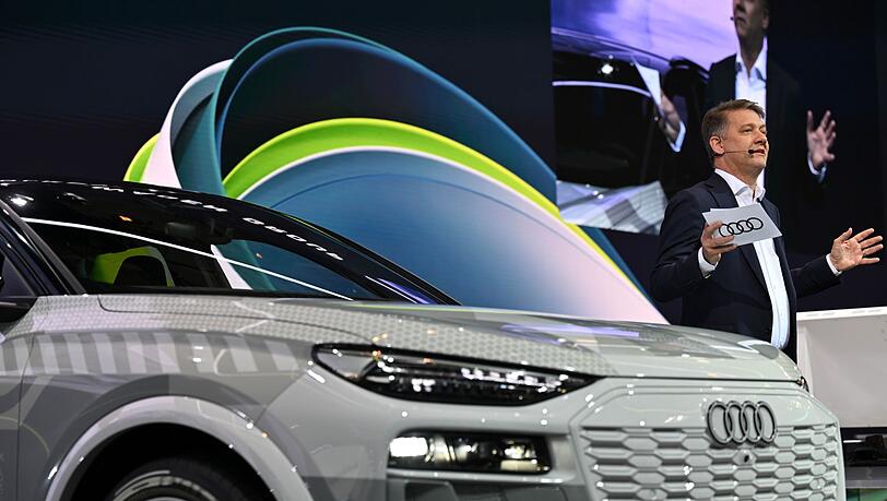 Gernot Döllner, CEO der Audi AG, spricht beim Pressetag der Auto- und Verkehrsmesse IAA in einer Halle der Messe München.