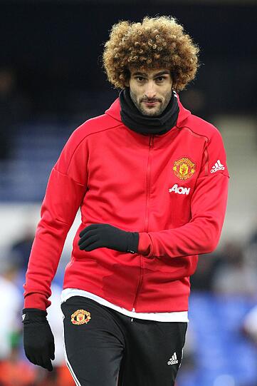 Die Haare stets schön hat auch der Belgier Marouane Fellaini.