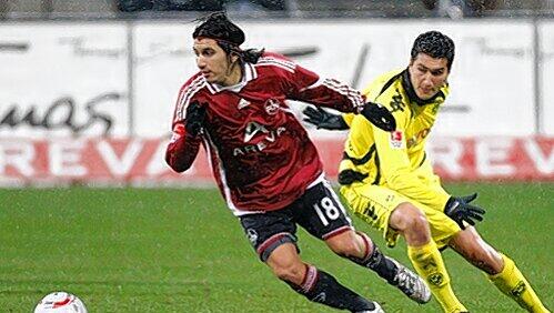 Dank ihm boomt der Club im israelischen TV: Nationalspieler Almog Cohen, der hier Dortmunds Superstar Nuri Sahin (r.) davonläuft. Dank ihm boomt der Club im israelischen TV: Nationalspieler Almog Cohen, der hier Dortmunds Superstar Nuri Sahin (r.) davonläuft.