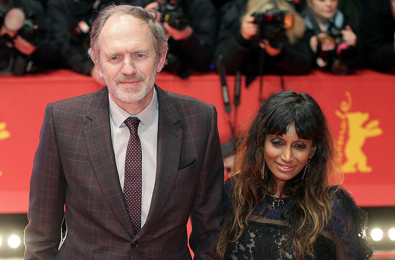 Der niederländische Fotograf Anton Corbijn und Ruth "Nimi" Ponnudurai bei der Berlinale.