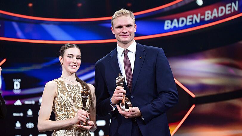 Deutschlands Sportlerin und Sportler des Jahres, Darja Varfolomeev und Oliver Zeidler, freuen sich auf besinnliche Tage.