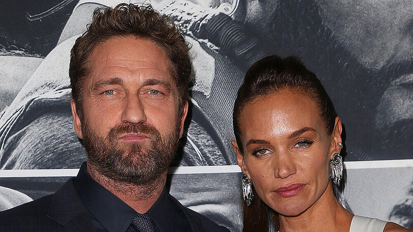 Gerard Butler und Morgan Brown auf dem roten Teppich