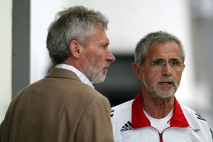 Hier mit Paul Breitner.