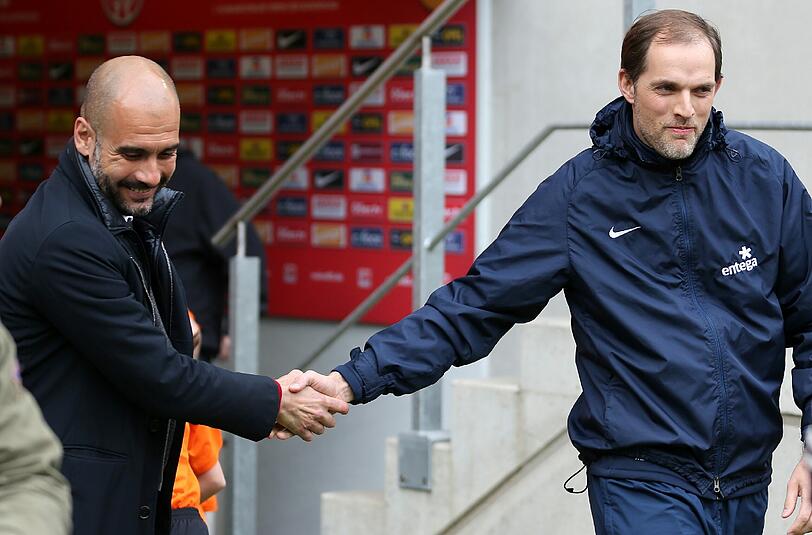 Verstehen sich nicht nur menschlich: Pep Guardiola und Thomas Tuchel, hier noch als Trainer vom FSV Mainz (Archivbild)