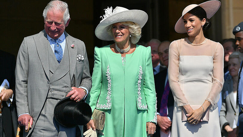 Ehe-Glück: Herzogin Meghan und Prinz Harry kommen zu einem Gartenfest im Buckingham Palace. Es ist der erste öffentliche Auftritt nach ihrer Hochzeit am 19. Mai.
