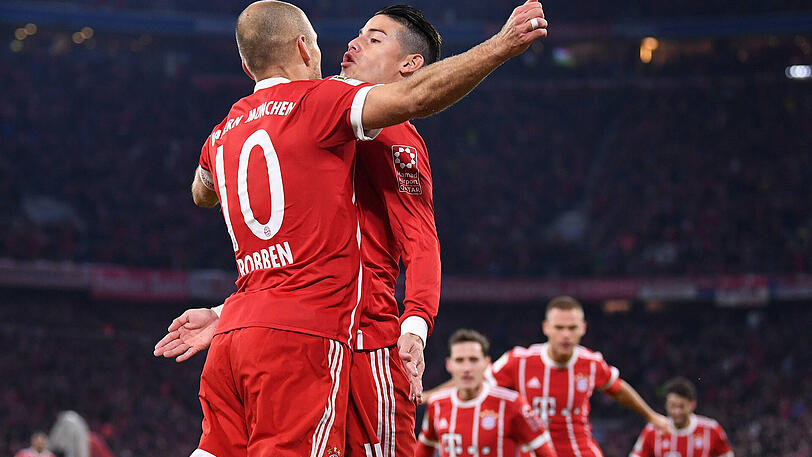 Endlich wieder Spitzenreiter: Die Bayern um Arjen Robben (l.) und James Rodríguez.