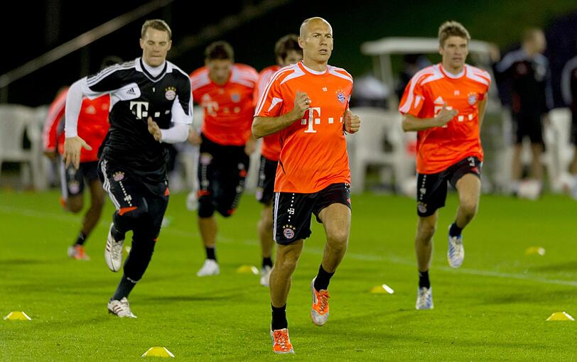 Torwart Manuel Neuner (l-r), Arjen Robben und Thomas Müller.