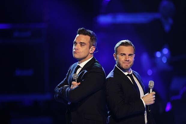Robbie Williams (l.) und Gary Barlow von Take That bei einem Auftritt in der Castingshow "Popstars - Girls Forever" am 18.11.2010 in Köln.