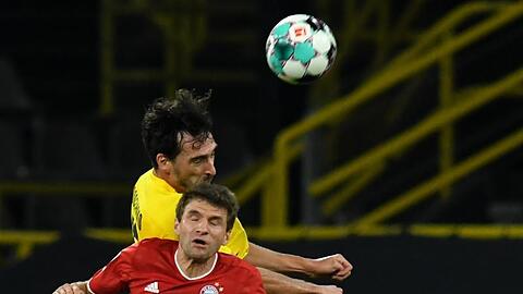 Die Sommerspiele 2021 in Tokio finden ohne den ehemaligen Fußball-Weltmeister Thomas Müller (vorn, im Duell mit Mats Hummels) statt.