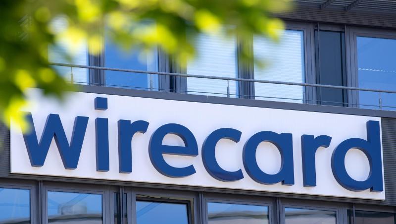 Der Schriftzug von Wirecard ist an der Firmenzentrale zu sehen. Foto: Sven Hoppe/dpa/Symbolbild
