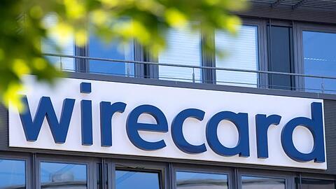Der Schriftzug von Wirecard ist an der Firmenzentrale zu sehen. Foto: Sven Hoppe/dpa/Symbolbild