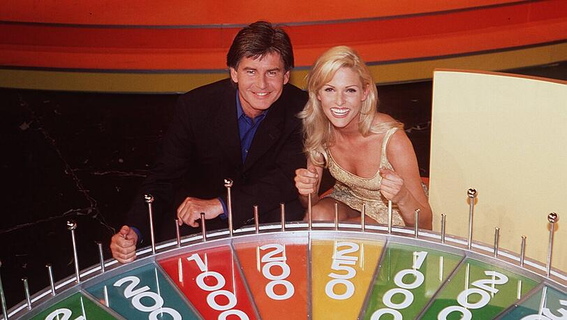 1998: "Glücksrad"-Moderator Frederic Meisner mit Buchstabenfee Sonya Kraus