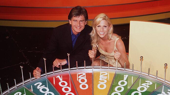 1998: "Glücksrad"-Moderator Frederic Meisner mit Buchstabenfee Sonya Kraus