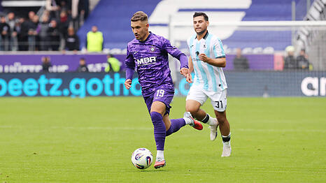 Ab der neuen Saison Teamkollegen? Julian Guttau (vorne) im Laufduell mit Kevin Volland.