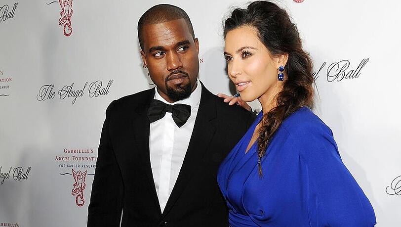 Kanye West neben seiner Frau Kim Kardashian Kanye West neben seiner Frau Kim Kardashian