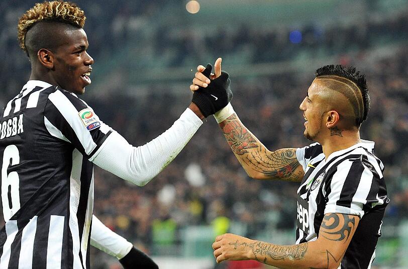 Ehemalige Mitspieler: Paul Pogba von Juventus Turin trifft auf Arturo Vidal, der nun für den FC Bayern aufläuft.