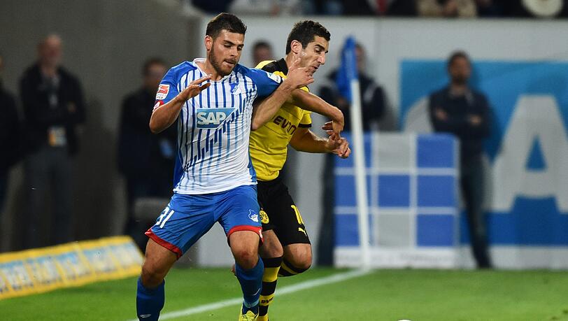 Hoffenheims Kevin Volland (l.) und Dortmunds Henrikh Mkhitaryan kämpfen um den Ball. Hoffenheims Kevin Volland (l.) und Dortmunds Henrikh Mkhitaryan kämpfen um den Ball.