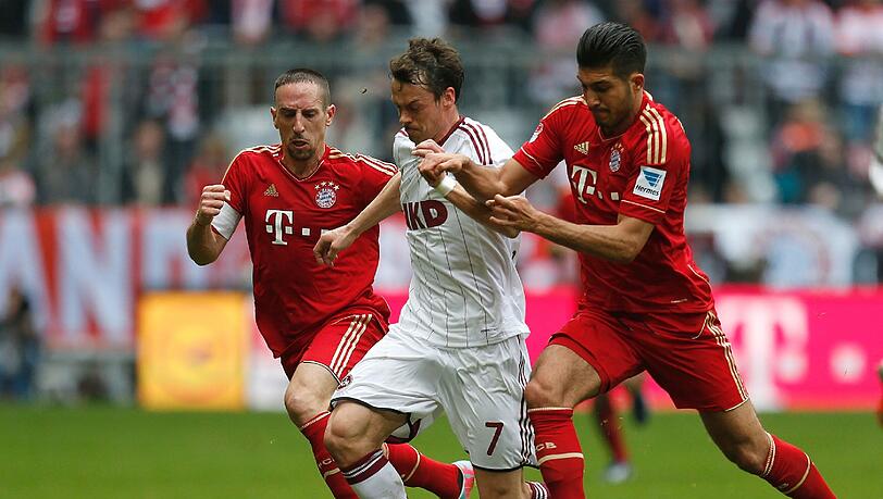 Kein Mittel gegen starke Bayern. Auch Nürnbergs Markus Feulner (M.), im Hinspiel noch Torschütze zum 1:1, knnte beim der 0:4-Klatsche am Samstag nichts ausrichten. Kein Mittel gegen starke Bayern. Auch Nürnbergs Markus Feulner (M.), im Hinspiel noch Torschütze zum 1:1, knnte beim der 0:4-Klatsche am Samstag nichts ausrichten.