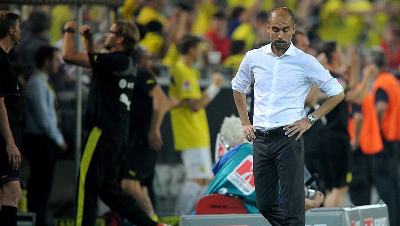 Dreimal musste Pep Guardiola eine Niederlage des FC Bayern gegen Borussia Dortmund mitansehen. Dreimal musste Pep Guardiola eine Niederlage des FC Bayern gegen Borussia Dortmund mitansehen.