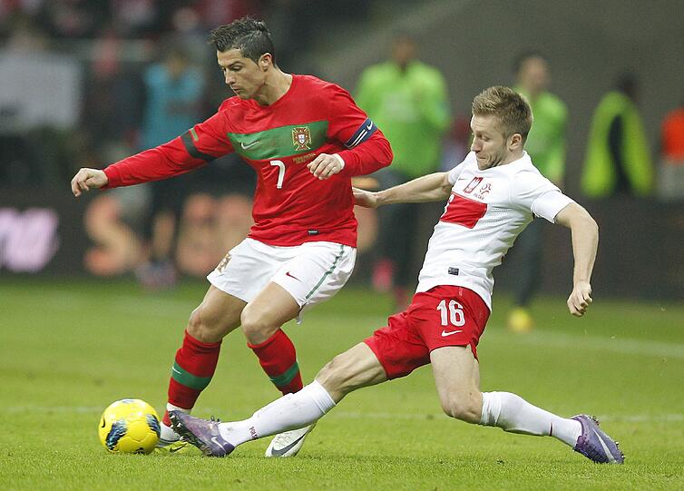 Deutschlands EM-Gruppengegner Portugal bekleckerte sich in Polen nicht mit Ruhm - Ronaldo und Co. kamen beim EM-Gastgeber nicht über ein torloses Remis hinaus.