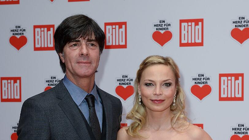 Fußball-Bundestrainer Jogi Löw und Boxweltmeisterin Regina Halmich Fußball-Bundestrainer Jogi Löw und Boxweltmeisterin Regina Halmich