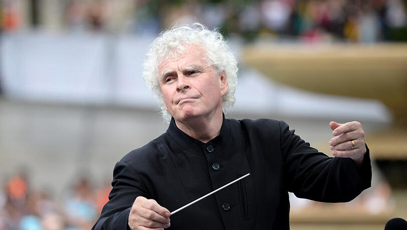Sir Simon Rattle.