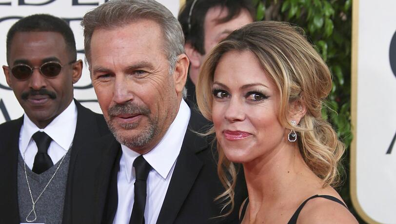 Kevin Costner und Christine Baumgartner liefern sich einen öffentlichen Rosenkrieg.