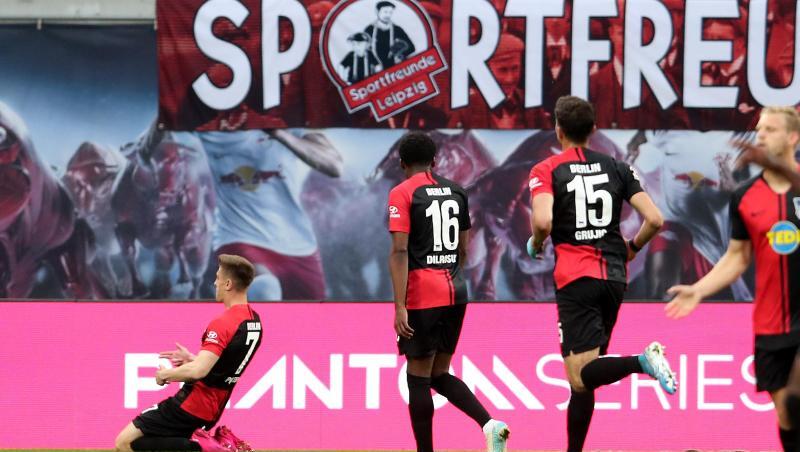 Krzysztof Piatek (l) bescherte Hertha BSC einen Punkt bei RB Leipzig. Krzysztof Piatek (l) bescherte Hertha BSC einen Punkt bei RB Leipzig.