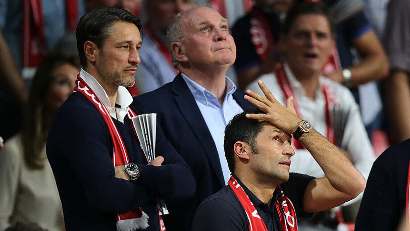 Hatten auch beim Basketball-Auftritt des FC Bayern keinen Grunde zur Freude: Niko Kovac (links), Uli Hoeneß und Hasan Salihamidzic (unten).