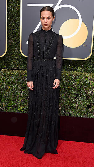 Top: Hochgeschlossen kann ziemlich sexy sein, wie hier bei Alicia Vikander in Louis Vuitton.