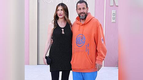 Adam Sandler wie er leibt und lebt: mit Ehefrau Jackie bei einer Hollywood-Galapremiere.