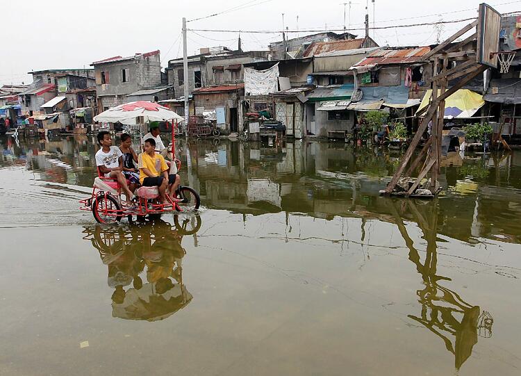 Taifun &bdquo;Nari&ldquo; auf den Philippinen schwere Schäden hinterlassen. Die Bilder.