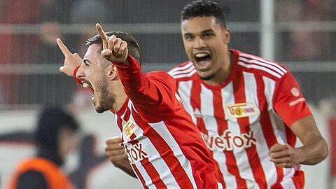 Josip Juranovic (l) und der 1. FC Union Berlin werden auch in der kommenden Saison im Europapokal auflaufen.