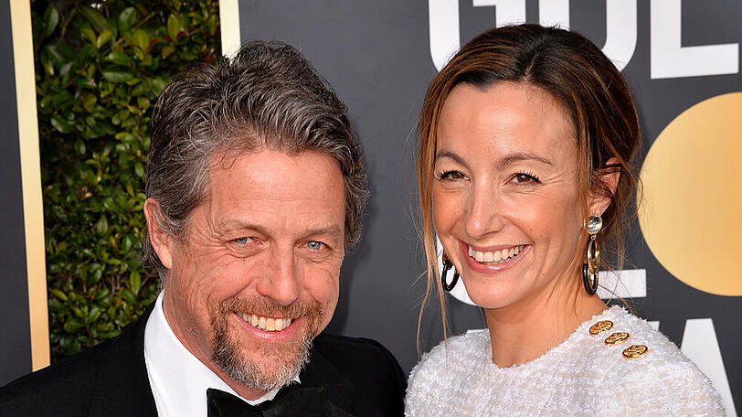 Hugh Grant mit seiner Ehefrau Anna Eberstein